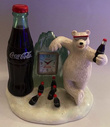 3105-2 € 17,50 Coca Cola mini klokje beer bij fles